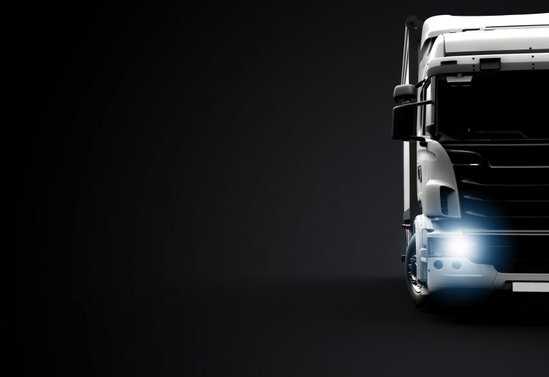 Front,View,Of,A,Truck,On,A,Black,Background.,3d