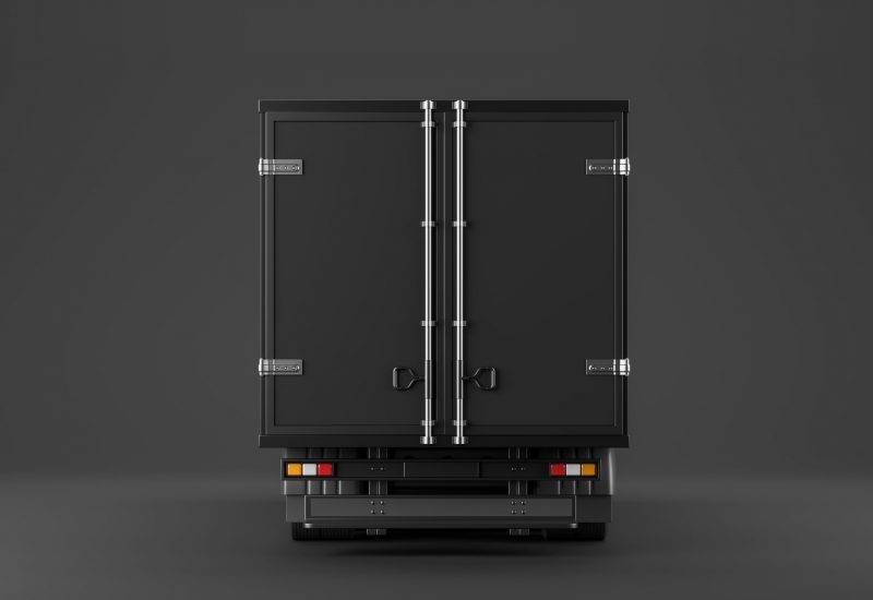 Back,View,Of,Closed,Black,Truck,,Isolated,Over,Black,Background.